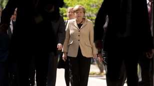 Putin z Merkel o Genewie. "Pewne oceny tego dokumentu nie są zbieżne"
